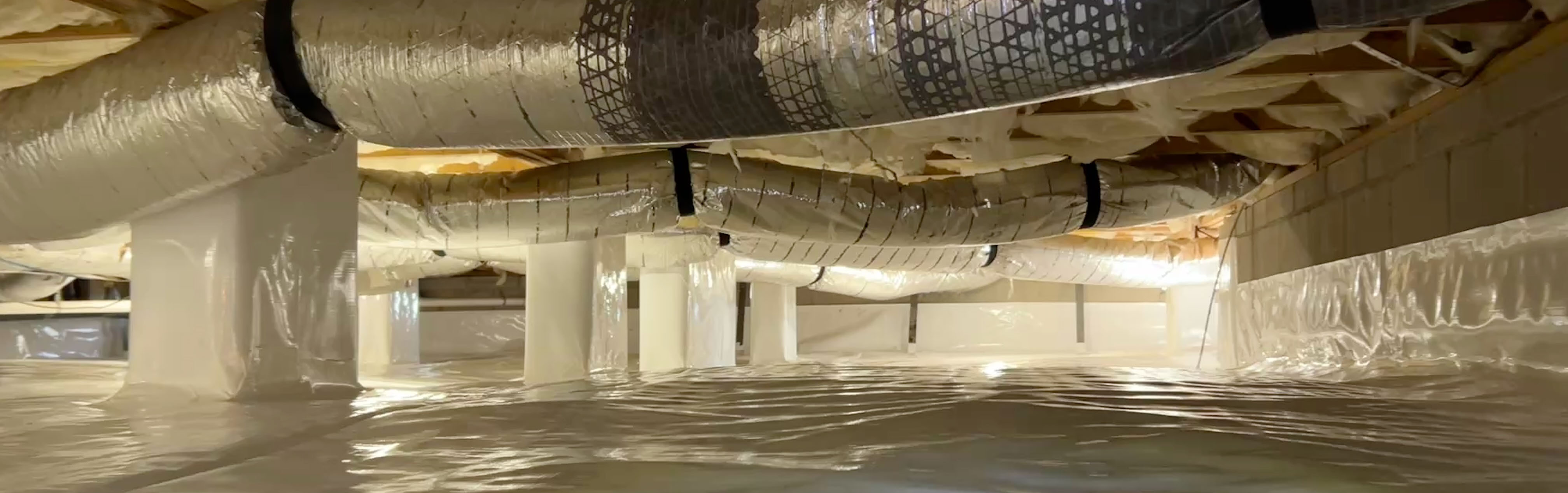 Encapsulating a crawlspace in a home